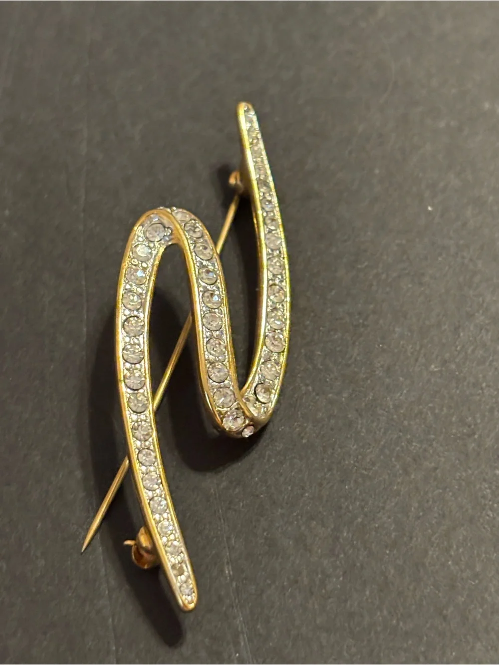 Signed Monet Gold Tone Clear Rhinestone Swirl Ribbon Brooch Pin Vintage Elegant